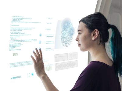 Girl coding on a interactive screen